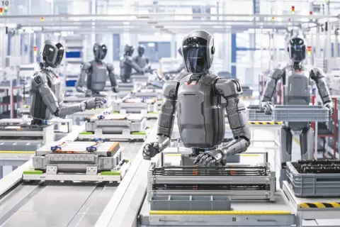 Roboty pracują na linii produkcyjnej, montując baterie. To przyszłość, którą przewidział każdy ekonomista.
