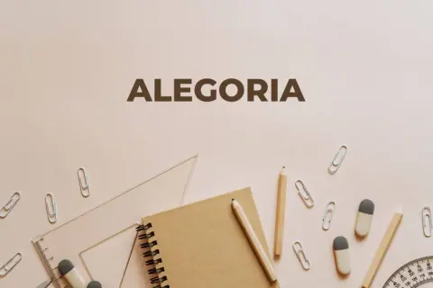 Szkolne przybory, jak ołówki i linijki, tworzą tło dla napisu "ALEGORIA". To wizualna alegoria nauki i kreatywności.
