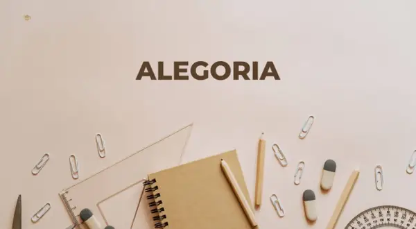 Szkolne przybory, jak ołówki i linijki, tworzą tło dla napisu "ALEGORIA". To wizualna alegoria nauki i kreatywności.