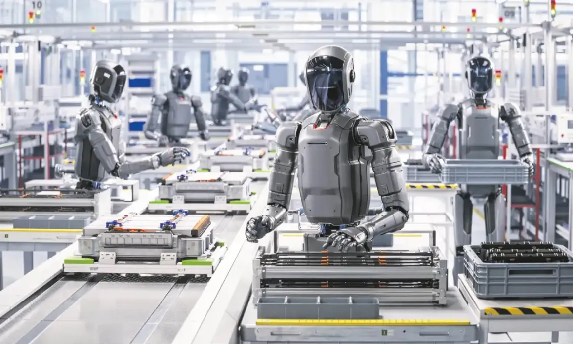 Roboty pracują na linii produkcyjnej, montując baterie. To przyszłość, którą przewidział każdy ekonomista.