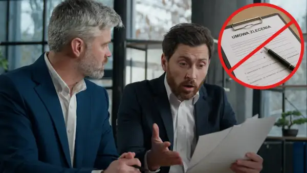Dwóch mężczyzn analizuje dokumenty. Na pierwszym planie umowa zlecenia z przekreśleniem, sugerująca problemy z zatrudnieniem.
